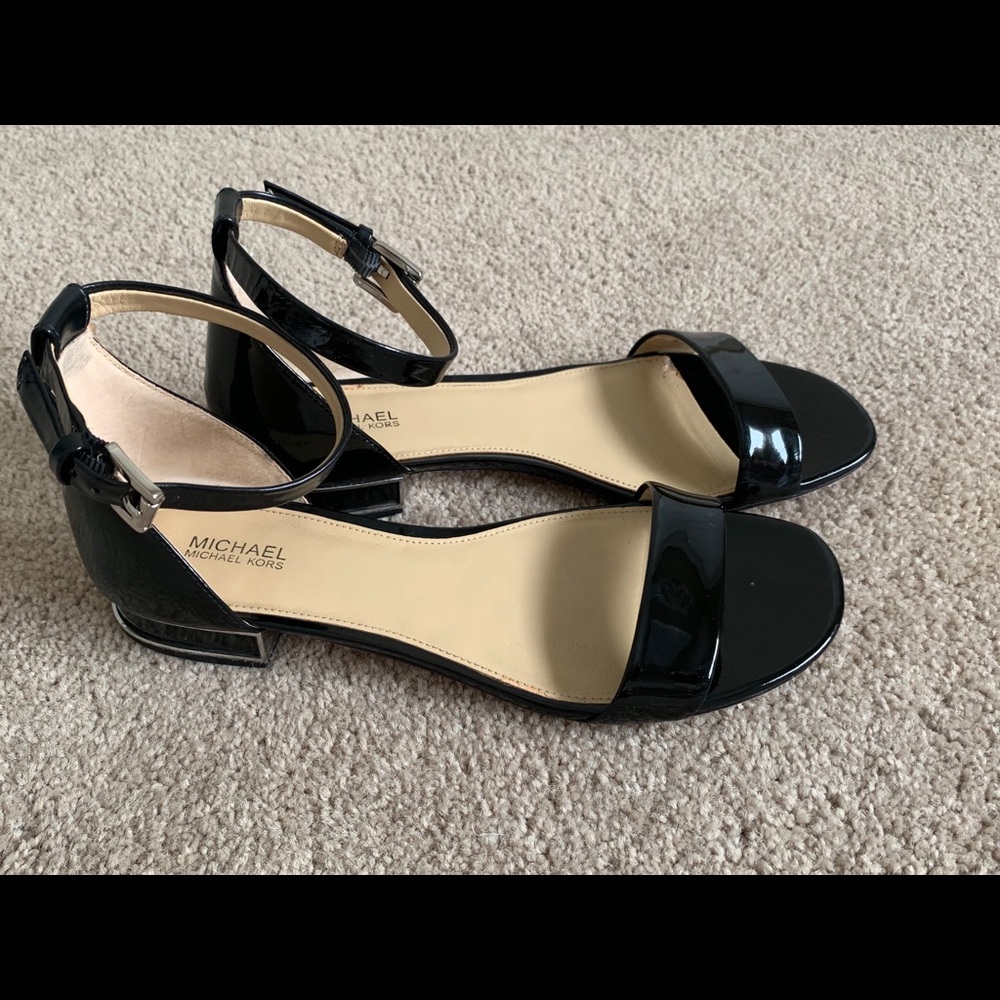 Michael Kors Black Flat sandals.